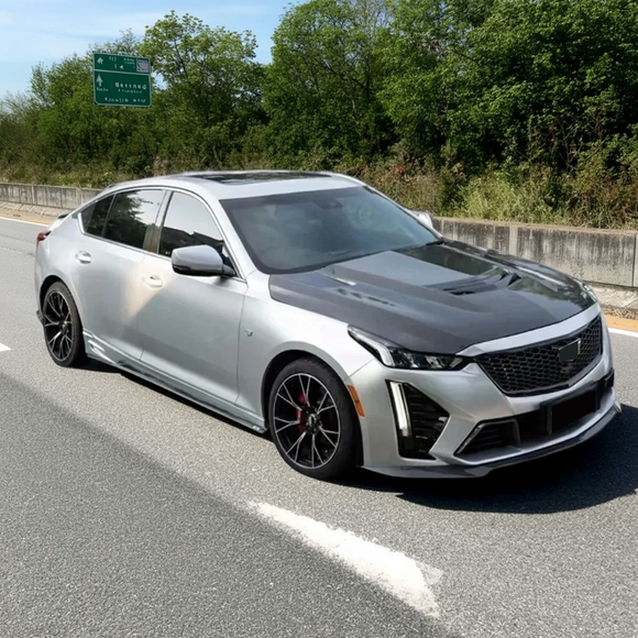 Sleek carbon fiber hood panel installed on a Cadillac CT5-V