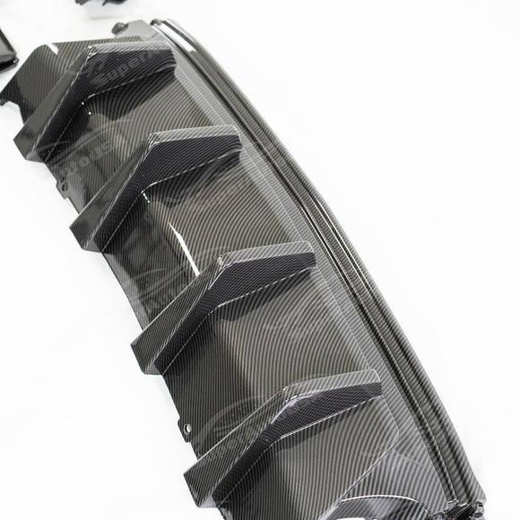 First step of carbon fiber print rear diffuser installation for Camaro