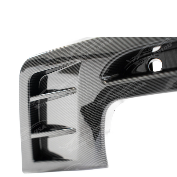 Carbon fiber print rear diffuser lip on a white Chevrolet Camaro