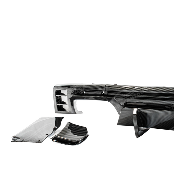 Uninstalled carbon fiber print rear bumper diffuser lip, top view
