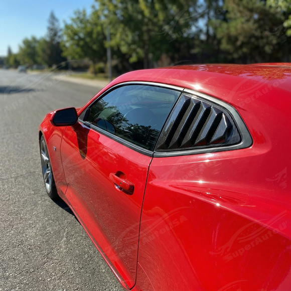 Carbon fiber print rear window louver sunshade installed on a 2016 Chevrolet Camaro