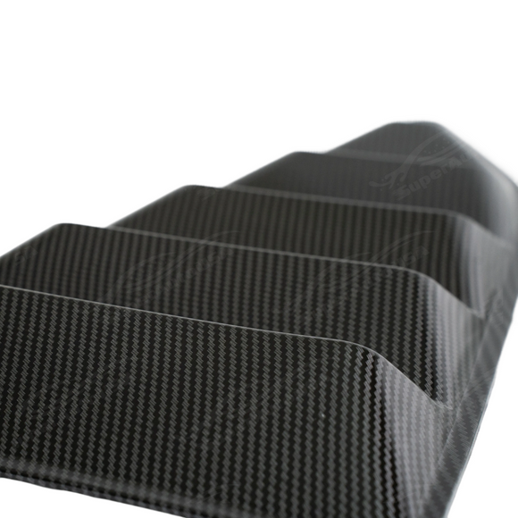 Precision fitment along the rear glass edges of a 2022 Chevrolet Camaro