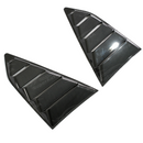 Uninstalled carbon fiber print rear window louver showing the lightweight one-piece design