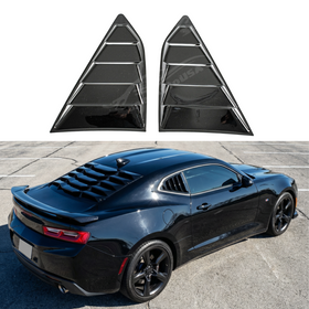 Gloss black rear window louver sunshade installed on a 2016 Chevrolet Camaro