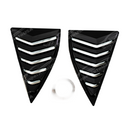 Looking out from the interior of the Camaro through the rear window louver slats