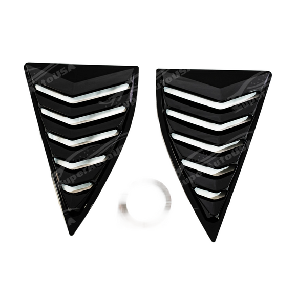 Looking out from the interior of the Camaro through the rear window louver slats