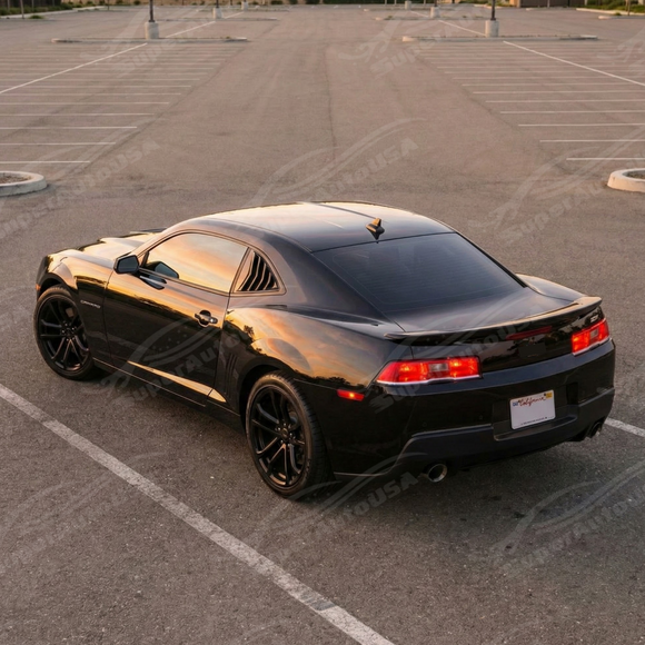 Full rear 3/4 view of a 2011 Chevrolet Camaro with the gloss black rear louver