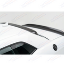 Uninstalled carbon fiber print roof spoiler showing the smooth aerodynamic top surface