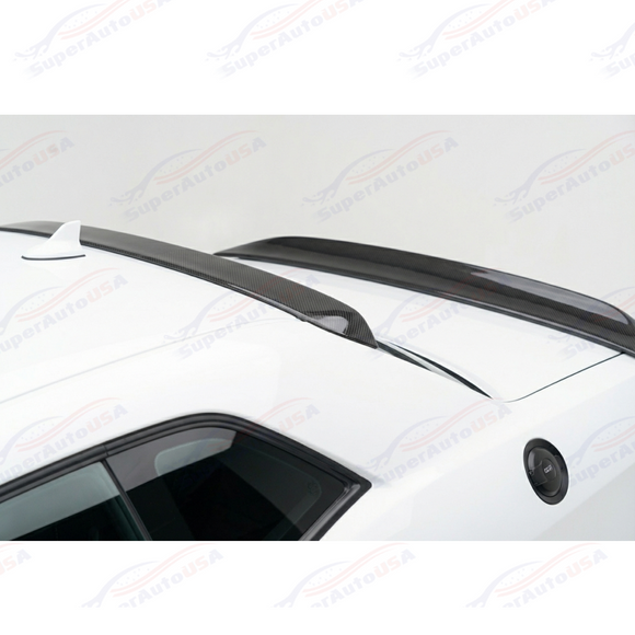 Uninstalled carbon fiber print roof spoiler showing the smooth aerodynamic top surface