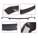 Standalone bench view of the uninstalled C8 Z51 style carbon look rear wing assembly and mounting stanchions