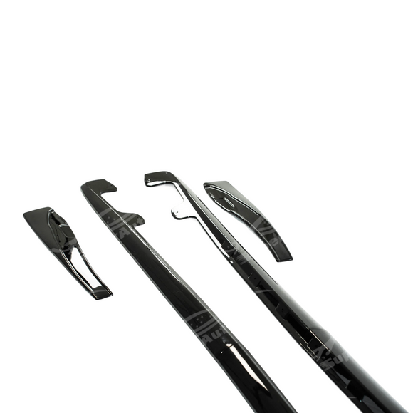 Underside view of the gloss black side skirt showing mounting points for Corvette C6