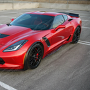 Uninstalled 4-piece carbon fiber print side skirts kit laid out