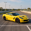 Uninstalled pair of Z06 style gloss black side skirt rocker panels