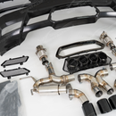 3/4 rear shot showing the aggressive side vents and center quad-tip integration of the SRM bumper kit