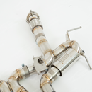 Rear 3/4 view of the SRM center-exit exhaust conversion featuring the signature quad-tip Z06 layout
