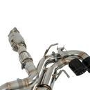 Close-up of the 3-inch V-band flange connecting the high-flow cats to the Switchblade catback