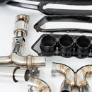 Direct rear view of the quad-tip center-exit SRM exhaust for 2020-2026 Corvette C8
