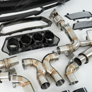 Close-up of the precision TIG welds on the high-flow SRM stainless steel exhaust system