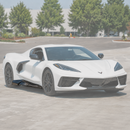 Carbon fiber exotic style wide side skirt extensions installed on a 2020+ Chevrolet Corvette C8 Stingray
