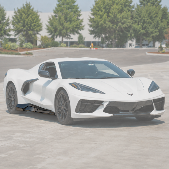 Carbon fiber exotic style wide side skirt extensions installed on a 2020+ Chevrolet Corvette C8 Stingray