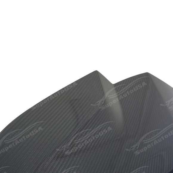 Carbon fiber hood overlay integrated on a black Chevrolet Corvette C8