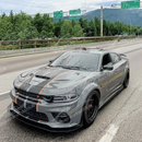 Custom look achieved with real carbon fiber hood on Charger