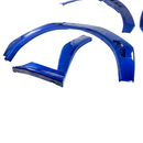 The vibrant K7X WR Blue Pearl on WRX fender flares

