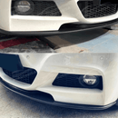 Profile shot highlighting the Gloss Black Front Lip Spoiler on Fits BMW 2012-2019 3-Series F30 M Sport Auto Plus Style, showcasing sleek lines and design