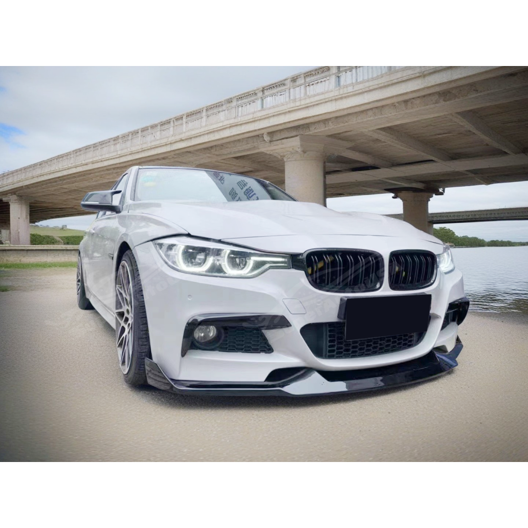Artistic view of the Fits BMW 2012-2019 3-Series F30 M Sport with its gloss black front splitter spoiler lip, blending performance with aesthetic appeal