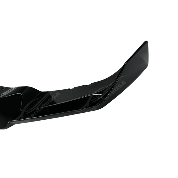 Low angle perspective of the Fits BMW 2012-2019 3-Series F30 M Sport with the Gloss Black Front Bumper Lip Spoiler, accentuating the vehicle's sporty stance