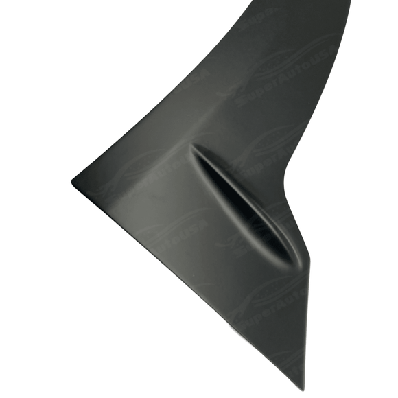 Close-up of matte black front lip winglets on a BMW M3 F80, designed to improve the car's aerodynamics from 2015 to 2020