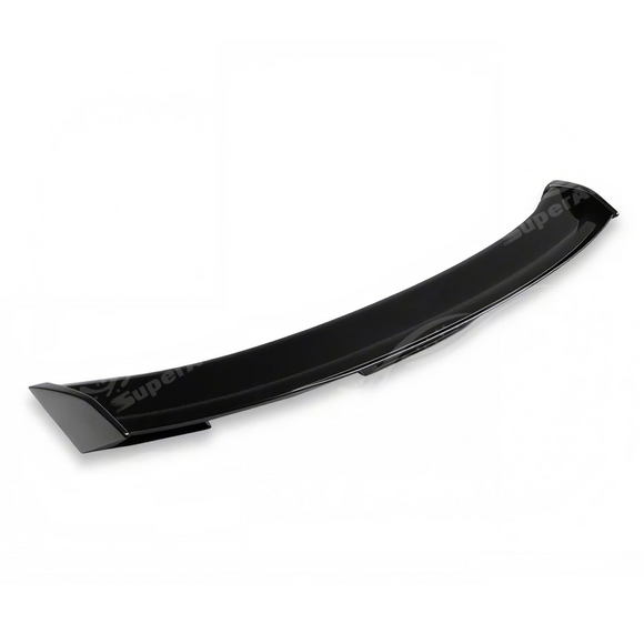 High-contrast visual presence of the Dark Horse style spoiler mounted on an Oxford White Ford Mustang S550