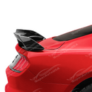Side profile perspective showcasing the raised aerodynamic upward sweep and trunk lid overhang