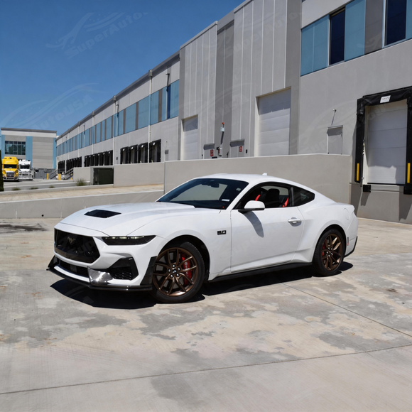 High-performance aesthetic of the real carbon front lip accenting a Race Red 2025 Mustang S650