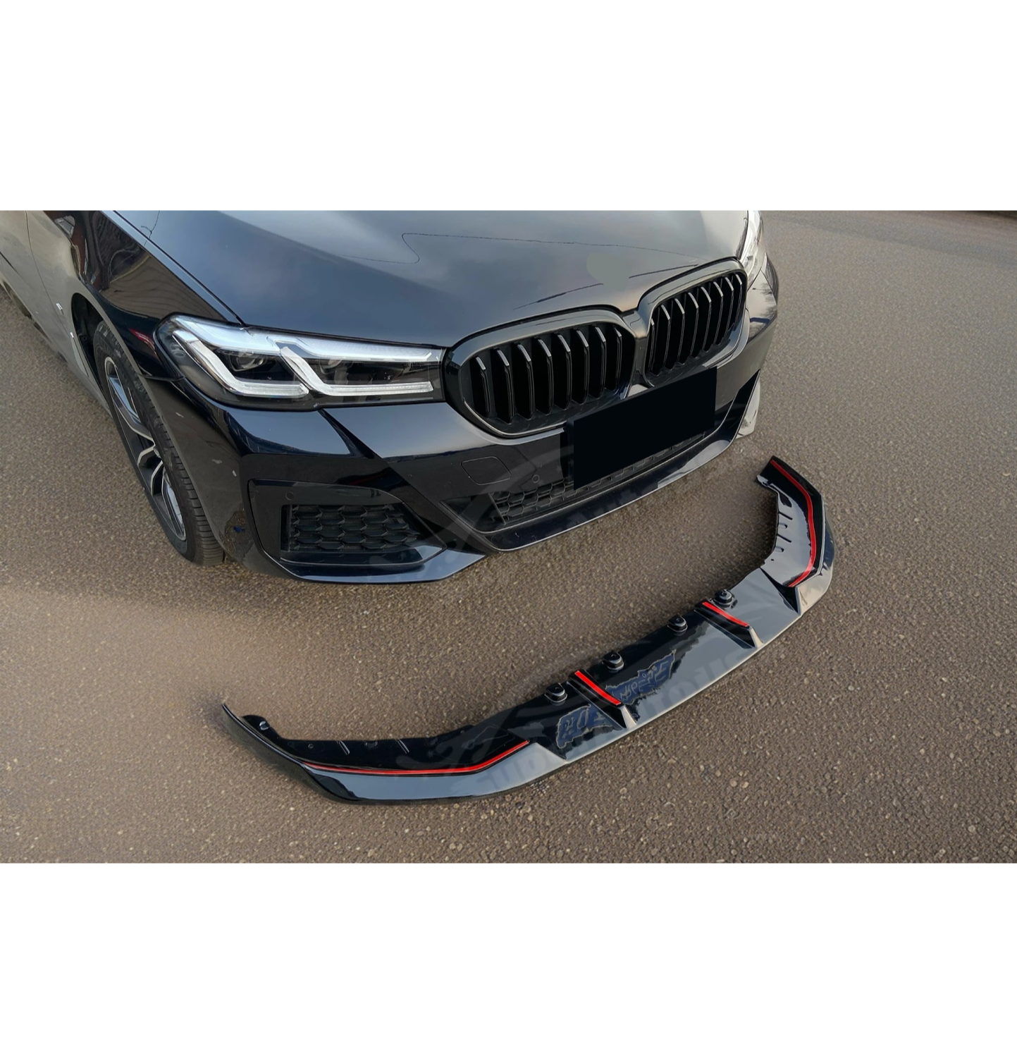 Front-end display of the Fit 2021-2024 BMW 5 Series G30 with the Gloss Black Front Bumper Lip Spoiler, highlighting the vehicle's enhanced profile.