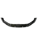 Low angle view of the BMW 5 Series G30 with its gloss black front splitter spoiler lip, emphasizing its ground-hugging design.