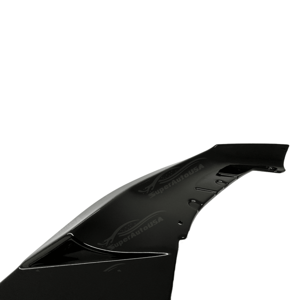 Front quarter view of the BMW 5 Series G30 with its gloss black front splitter spoiler lip, demonstrating the car's enhanced aerodynamics.