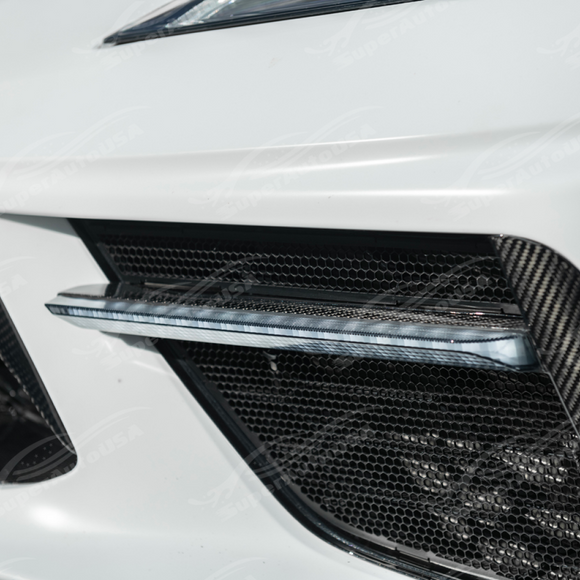 First step of carbon fiber LED DRL bezel installation for C8