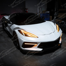 Rear view of the uninstalled carbon fiber LED DRL bezel showing wiring