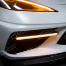 Corvette C8 in motion with illuminated carbon fiber LED DRL light bar bezel
