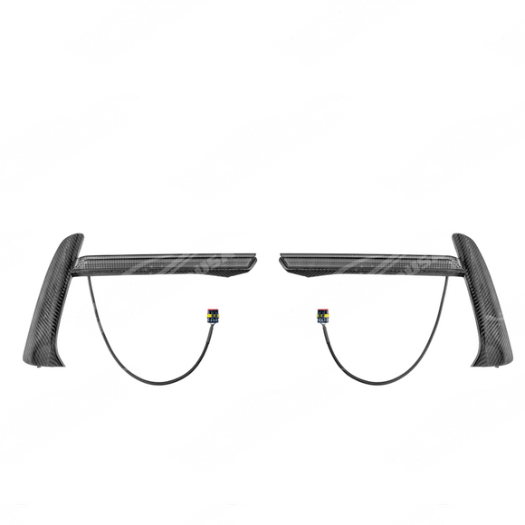 Uninstalled carbon fiber sequential LED DRL light bar bezel insert pair