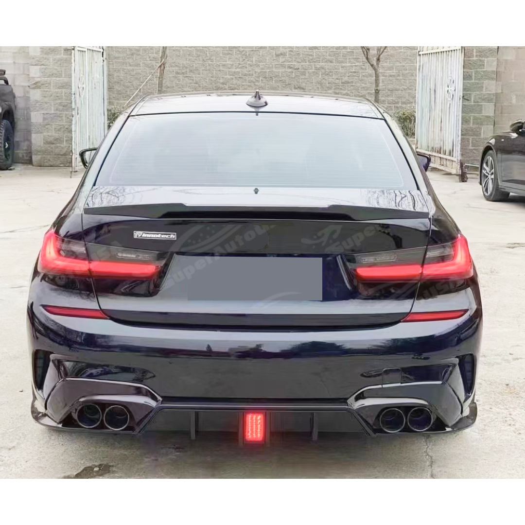Low angle perspective of Fits 2019-2022 BMW G20 with Gloss Black Rear Diffuser, highlighting the LED brake light and the aerodynamic corner splitters