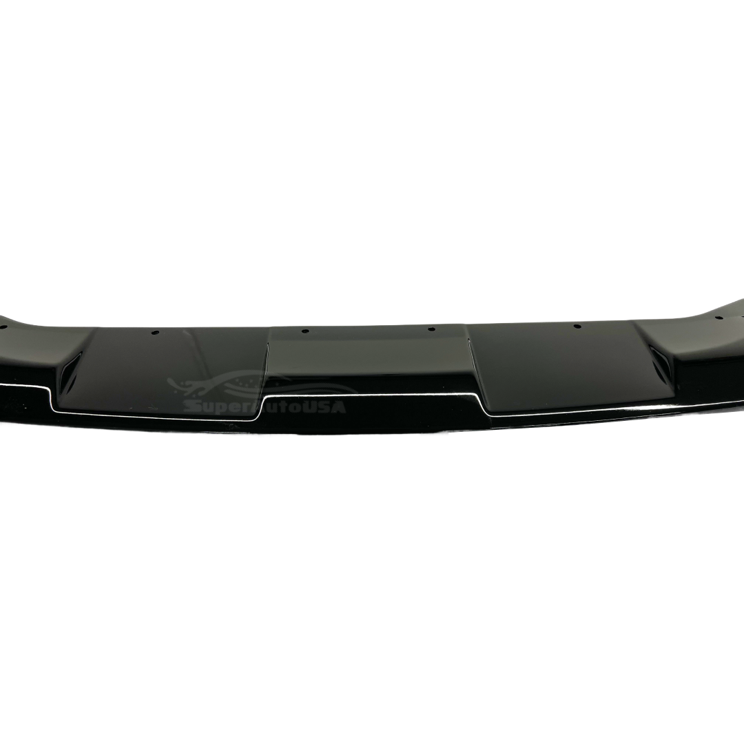 Elegant Front Spoiler in Car on a 2020 BMW 3 Series G20, showcasing its glossy black finish and streamlined design