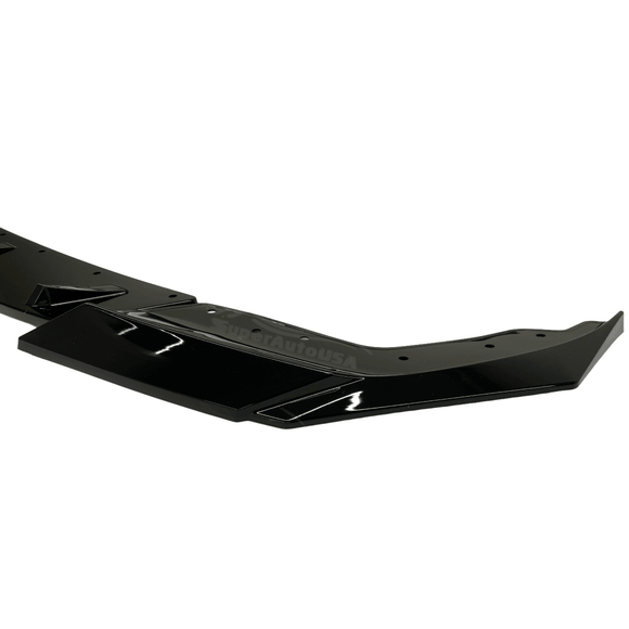 Gloss Black Lip Spoiler on the Front of 2022 BMW 3 Series G20, accentuating the vehicle's dynamic lines and lower stance