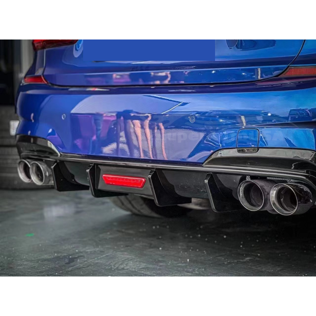 Rib Fin Rear Diffuser on a 2019 BMW 3 Series G20, featuring stylish Gloss Black finish and functional Rear Corner Splitter for improved aesthetics