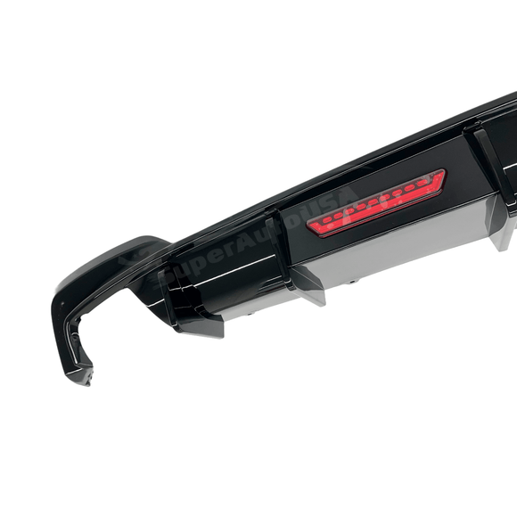 Elegant Rear Lower Bumper Wing Lip Diffuser in Gloss Black on a 2020 BMW 3 Series G20, showcasing its streamlined design and enhanced aerodynamics