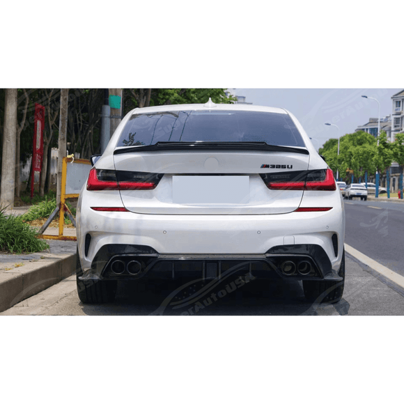 Added-On-Rear-Trunk-Spoiler-Wing in Gloss Black on BMW 3-Series G20, providing a sporty upgrade and improved air management for 2019 models