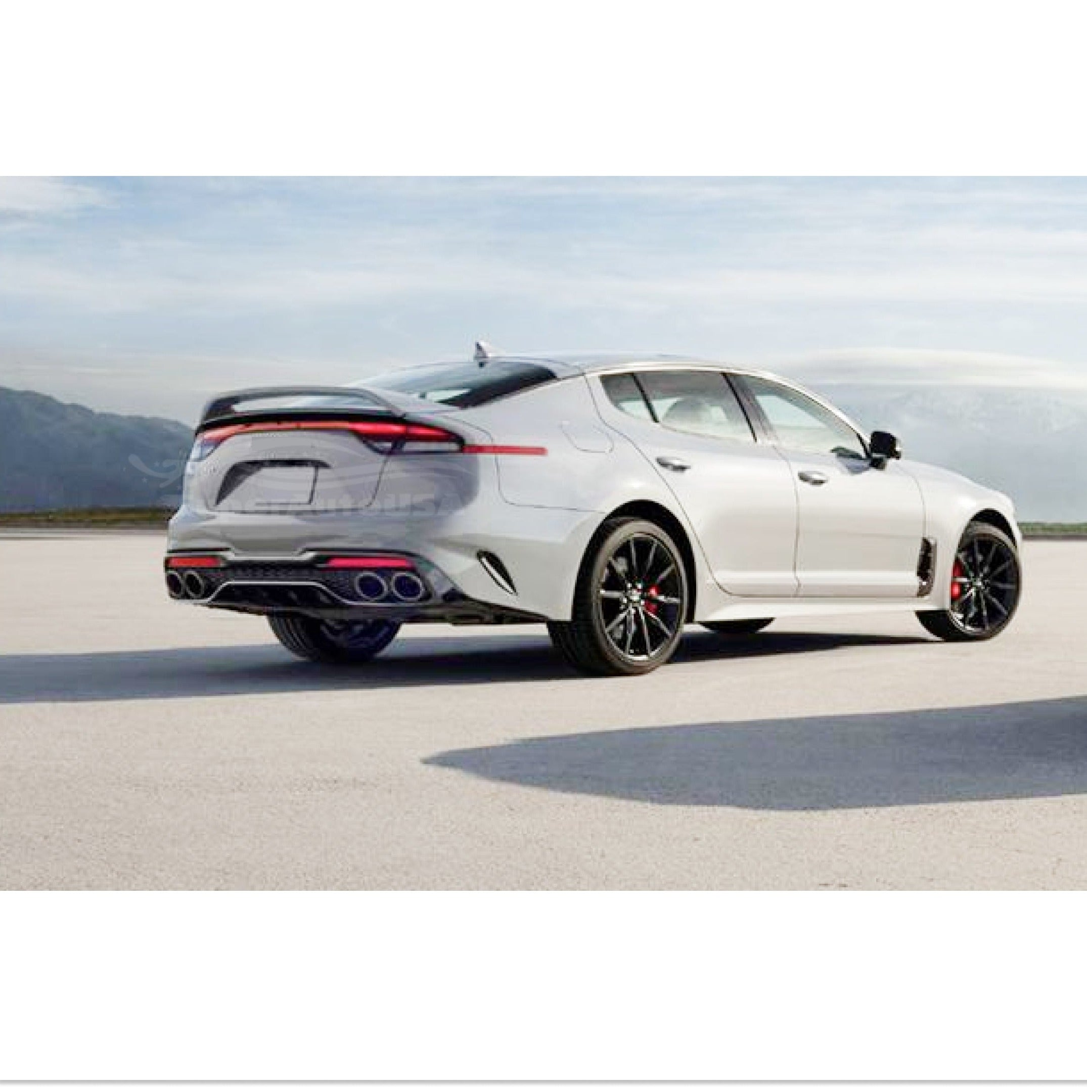 Side profile of the Fits Kia Stinger 2018-2023 featuring the Ceramic Silver Metallic Scorpion GT Style Rear Spoiler, adding a dynamic and sporty touch