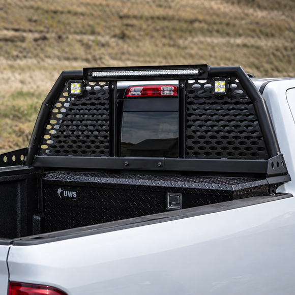 Heavy-duty adjustable reinforced steel roll bar headache rack installed on a Honda Ridgeline truck bed