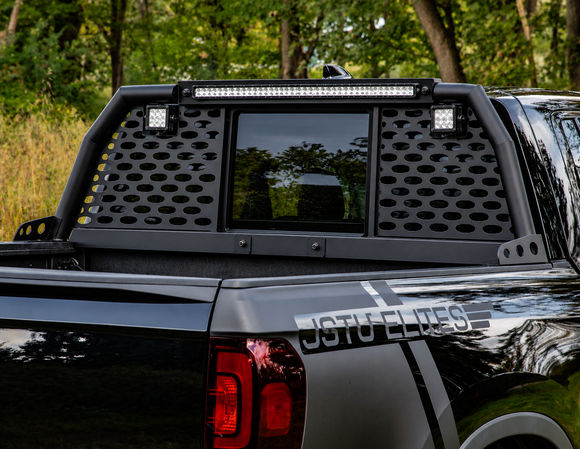 Side profile perspective showcasing the aggressive angular upright bars matching the Ridgeline C-pillar lines